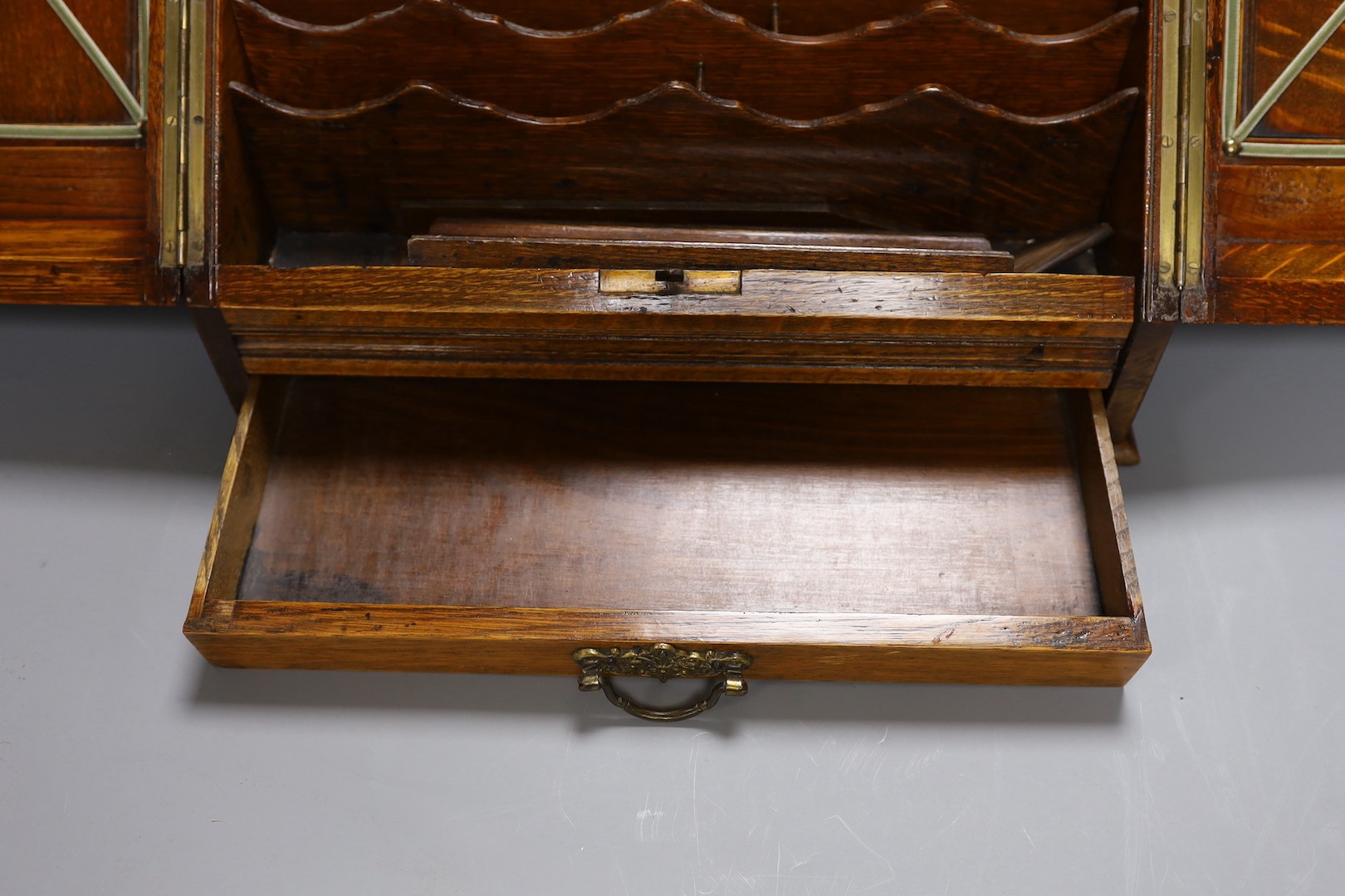 An Edwardian oak stationary box 36cm